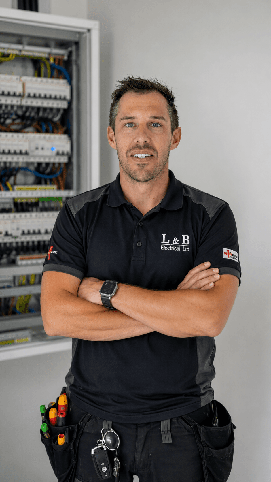 Tom Carter, Director of L&B Electrical, on site during an electrical installation